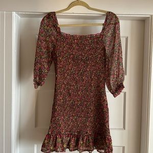 Multicolored floral ruched mini dress with ruffle bottom and bubble sleeves